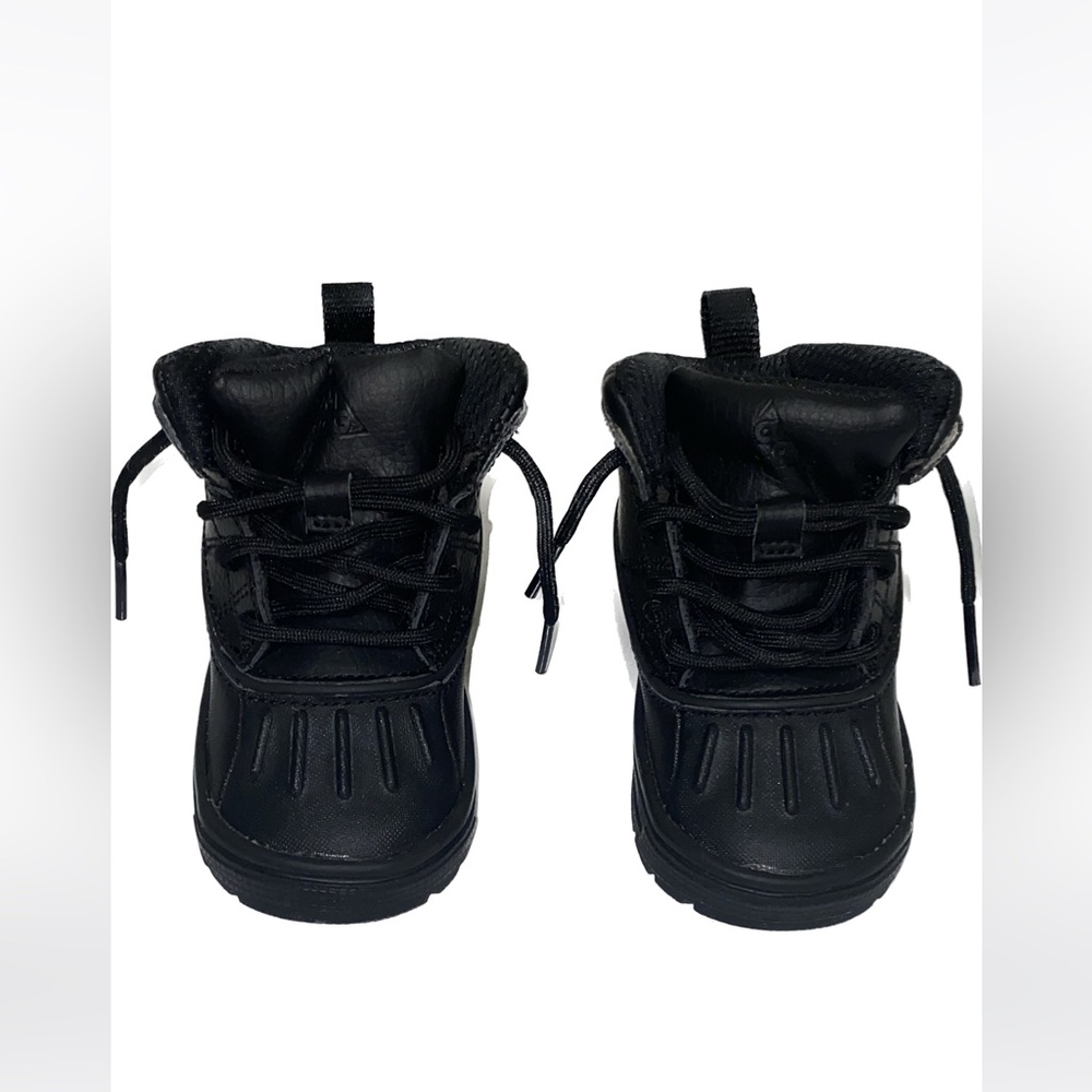 Toddler black waterproof winter nike boots, used but looks almost new.
